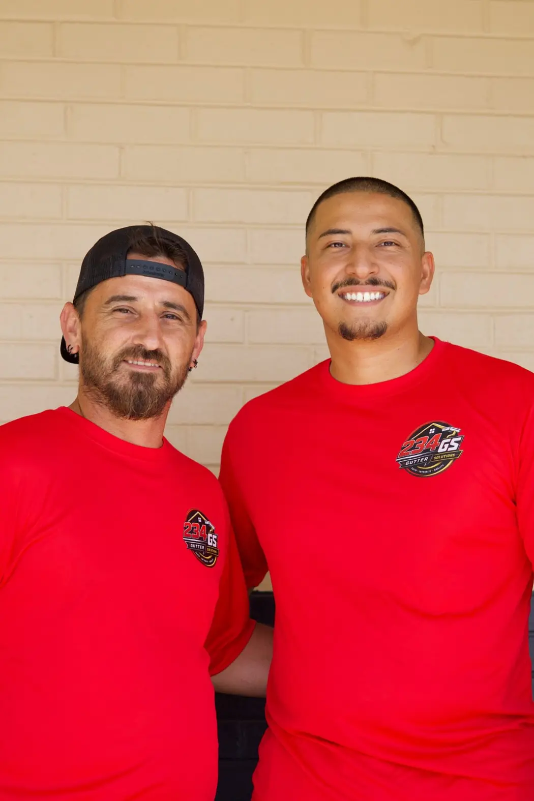 234 Gutter Solutions crew members in company shirts